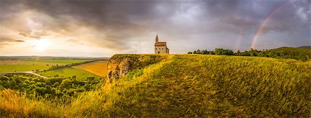 rainbow in architecture - Old Roman Catholic Church of St. Michael the Archangel with Rainbow on the Hill at Sunset in Drazovce, Slovakia Stock Photo - Budget Royalty-Free & Subscription, Code: 400-07982889