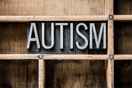 The word "AUTISM" written in vintage metal letterpress type sitting in a wooden drawer. Stock Photo - Budget Royalty-Free & Subscription, Code: 400-07983289