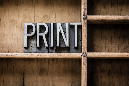 The word "PRINT" written in vintage metal letterpress type sitting in a wooden drawer. Photographie de stock - Aubaine LD & Abonnement, Code: 400-07983309