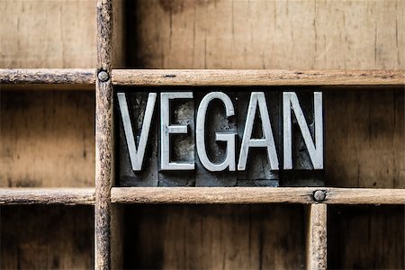 The word "VEGAN" written in vintage metal letterpress type sitting in a wooden drawer. Stock Photo - Budget Royalty-Free & Subscription, Code: 400-07983315