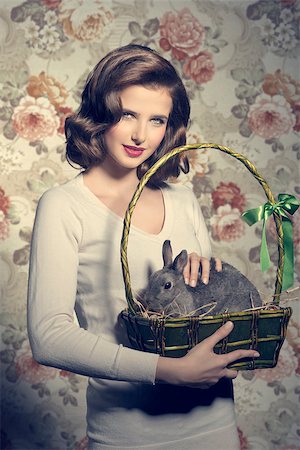 simsearch:400-08036285,k - Beautiful, natural, spring, brunette woman with little, fluffy bunny in the easter basket. Stockbilder - Microstock & Abonnement, Bildnummer: 400-07983484