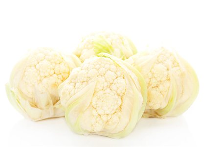 simsearch:400-07822704,k - Four baby cauliflower isolated on white background. Healthy vegetarian food. Photographie de stock - Aubaine LD & Abonnement, Code: 400-07994445