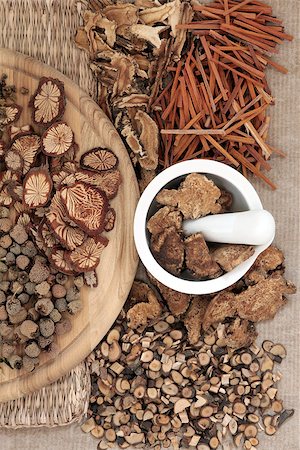 simsearch:400-06521200,k - Chinese herbal medicine selection with mortar and pestle. Fotografie stock - Microstock e Abbonamento, Codice: 400-07994505