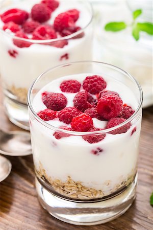 simsearch:400-08251879,k - Yogurt with muesli and raspberries in a glass Stock Photo - Budget Royalty-Free & Subscription, Code: 400-07994913