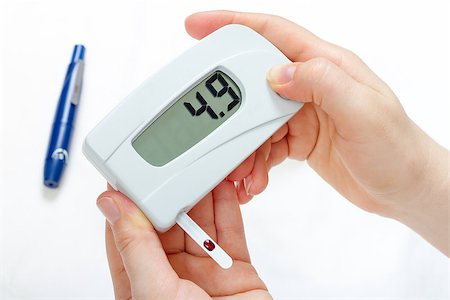 Measurement of blood glucose level digital device in diabetes Stock Photo - Budget Royalty-Free & Subscription, Code: 400-07994985