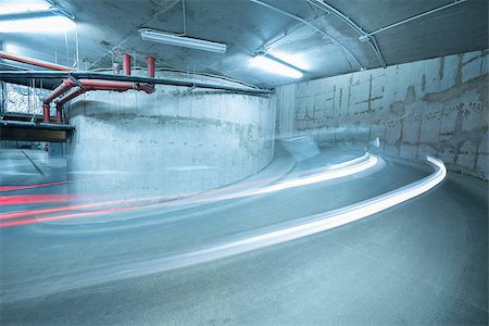 shopping mall nobody interior - Lights of the moving car above the spiral road to the underground parking. Stock Photo - Budget Royalty-Free & Subscription, Code: 400-07995556