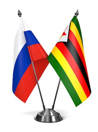 simsearch:400-07996971,k - Russia and Zimbabwe - Miniature Flags Isolated on White Background. Photographie de stock - Aubaine LD & Abonnement, Code: 400-07996320