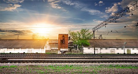 sunset railroad - Rails and industrial station at the sunset Stock Photo - Budget Royalty-Free & Subscription, Code: 400-07996694