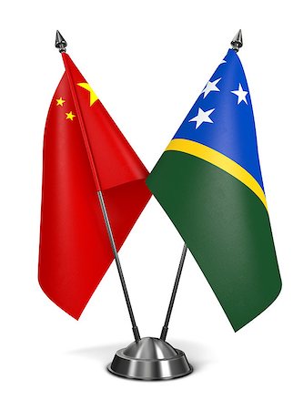 solomon - China and Solomon Islands - Miniature Flags Isolated on White Background. Foto de stock - Super Valor sin royalties y Suscripción, Código: 400-07996949