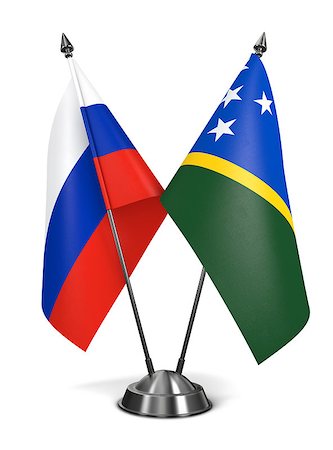 simsearch:400-07996632,k - Russia and Solomon Islands - Miniature Flags Isolated on White Background. Photographie de stock - Aubaine LD & Abonnement, Code: 400-07996975