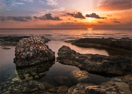 Sunset over the Sea and Rocky Coast with Ancient Ruins in Mahdia, Tunisia Photographie de stock - Aubaine LD & Abonnement, Code: 400-07997167