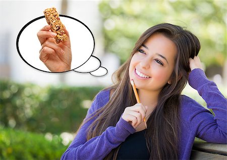 dreaming cloud girl - Pensive Woman with Nutritious Snack Bar Inside Thought Bubble. Stock Photo - Budget Royalty-Free & Subscription, Code: 400-07990016