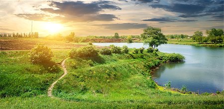 simsearch:400-06867510,k - Footpath near calm river in spring at sunrise Stock Photo - Budget Royalty-Free & Subscription, Code: 400-07990123