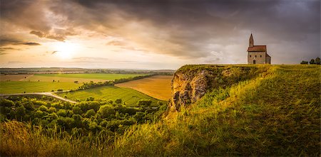 st michael - Old Roman Catholic Church of St. Michael the Archangel on the Hill at Sunset in Drazovce, Slovakia Photographie de stock - Aubaine LD & Abonnement, Code: 400-07990227