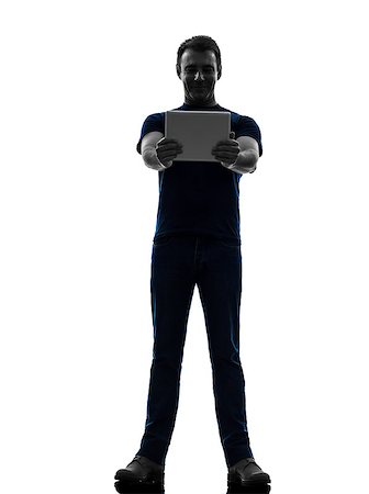 simsearch:400-08317008,k - one  man holding watching digital tablet in silhouette on white background Stockbilder - Microstock & Abonnement, Bildnummer: 400-07990346