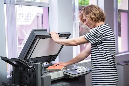 person photocopy - Student photocopying his book in the library at the university Stock Photo - Budget Royalty-Free & Subscription, Code: 400-07990785