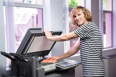 person photocopy - Student photocopying his book in the library at the university Stock Photo - Budget Royalty-Free & Subscription, Code: 400-07990786