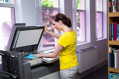 person photocopy - Student photocopying her book in the library at the university Stock Photo - Budget Royalty-Free & Subscription, Code: 400-07990793