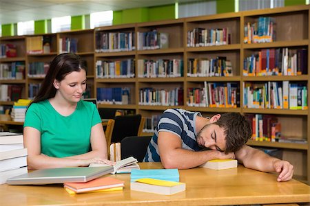 Students studying together in the library at the university Stock Photo - Budget Royalty-Free & Subscription, Code: 400-07990854