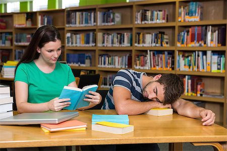 Students studying together in the library at the university Stock Photo - Budget Royalty-Free & Subscription, Code: 400-07990856
