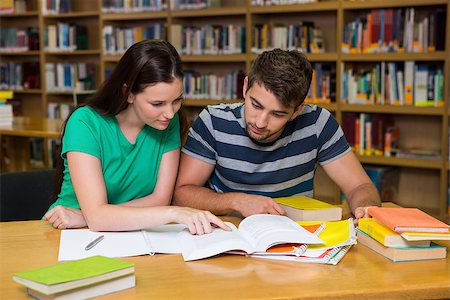 Students studying together in the library at the university Stock Photo - Budget Royalty-Free & Subscription, Code: 400-07990858