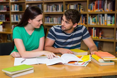 Students studying together in the library at the university Stock Photo - Budget Royalty-Free & Subscription, Code: 400-07990859