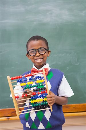 simsearch:400-07991069,k - Smiling pupil holding abacus at elementary school Foto de stock - Royalty-Free Super Valor e Assinatura, Número: 400-07991039