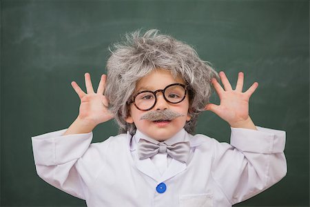 simsearch:400-07684082,k - Cute dressed up pupil showing his hands at elementary school Stock Photo - Budget Royalty-Free & Subscription, Code: 400-07991054