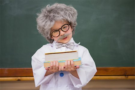 simsearch:400-07684082,k - Dressed up pupil holding books at elementary school Stock Photo - Budget Royalty-Free & Subscription, Code: 400-07991053