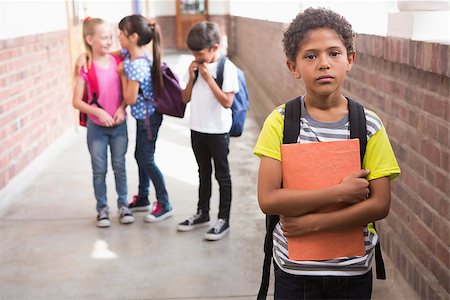 sad boy girl schools photos - Pupils friends teasing a pupil alone in elementary school Stock Photo - Budget Royalty-Free & Subscription, Code: 400-07991155