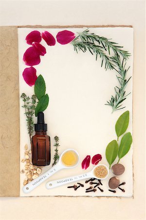 recipes paper - Pagan love potion ingredients over natural hemp notebook and mottled cream paper background. Stock Photo - Budget Royalty-Free & Subscription, Code: 400-07992874