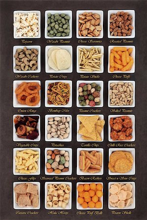 simsearch:400-07994208,k - Large savoury snack food selection in square porcelain bowls with titles Photographie de stock - Aubaine LD & Abonnement, Code: 400-07992875