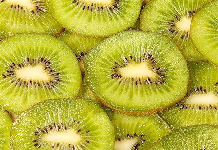 slised green Kiwi Background close up detailed Stock Photo - Budget Royalty-Free & Subscription, Code: 400-07992891