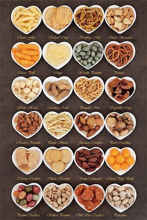 simsearch:400-07994208,k - Savory snack party food selection in heart shaped porcelain bowls with titles Photographie de stock - Aubaine LD & Abonnement, Code: 400-07993017