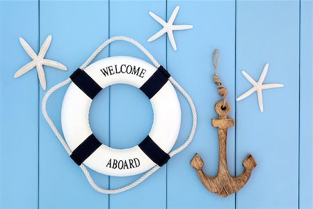 simsearch:400-07818974,k - Decorative lifebuoy, anchor and starfish sea shells over wooden blue background. Stock Photo - Budget Royalty-Free & Subscription, Code: 400-07993096