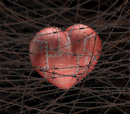 Metal heart with barbed wire around. Foto de stock - Royalty-Free Super Valor e Assinatura, Número: 400-07993556