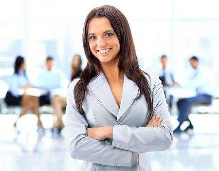 Business woman with her staff Stock Photo - Budget Royalty-Free & Subscription, Code: 400-07993596