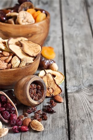 simsearch:400-07310170,k - Mix of dried fruits and almonds - symbols of judaic holiday Tu Bishvat. Copyspace background. Fotografie stock - Microstock e Abbonamento, Codice: 400-07993614