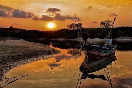 colorful tropical sunset with boat silhouettes in Thailand Stock Photo - Budget Royalty-Free & Subscription, Code: 400-07993748