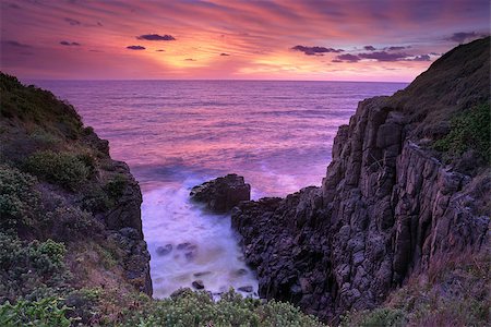 simsearch:400-07667033,k - Fiery red and orange sunrise skies bath the ocean and Minamurra volcanic  landscape cliffs in beautiful rich and vibrant colours Stock Photo - Budget Royalty-Free & Subscription, Code: 400-07993881