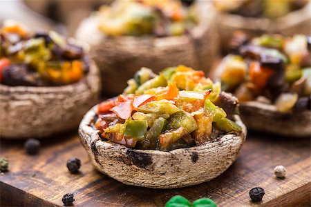 Portobello mushrooms stuffed with tomato, paprika, and mozzarella cheese. Stock Photo - Budget Royalty-Free & Subscription, Code: 400-07993913