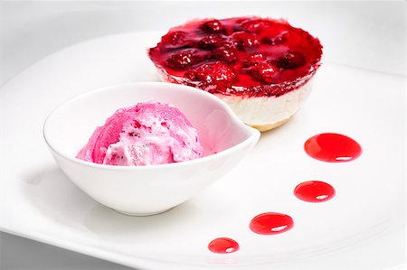 starush (artist) - Raspberry layered cheese cake and pink ice cream ball on white  plate, not isolated Stockbilder - Microstock & Abonnement, Bildnummer: 400-07993972