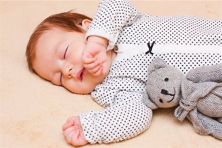 Little baby boy calmly sleeping with his teddybear. Stock Photo - Budget Royalty-Free & Subscription, Code: 400-08014500