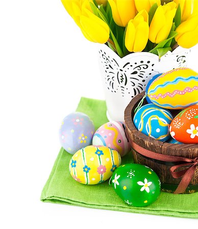 simsearch:689-03124006,k - Easter eggs in basket with yellow tulips. Isolated on white background Photographie de stock - Aubaine LD & Abonnement, Code: 400-08015238