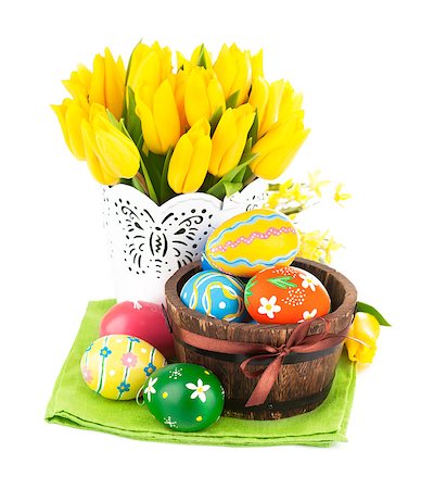simsearch:689-03124006,k - Easter eggs in basket with yellow tulips. Isolated on white background Photographie de stock - Aubaine LD & Abonnement, Code: 400-08015230