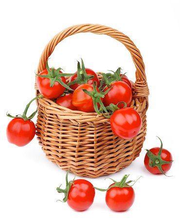 simsearch:400-06485810,k - Arrangement of Perfect Ripe Cherry Tomatoes with Stems in Wicker Basket isolated on white background Fotografie stock - Microstock e Abbonamento, Codice: 400-08015877