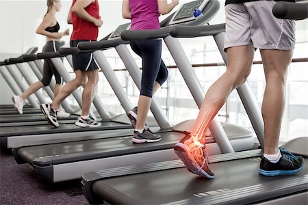 four shapes - Digital composite of Highlighted ankle of man on treadmill Stock Photo - Budget Royalty-Free & Subscription, Code: 400-08017380