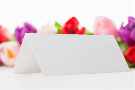 simsearch:400-06877837,k - Close up of colorful tulips and white card on wooden table Stock Photo - Budget Royalty-Free & Subscription, Code: 400-08017468