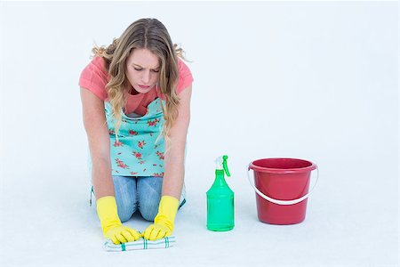 Woman cleaning the floor on white background Stock Photo - Budget Royalty-Free & Subscription, Code: 400-08017861