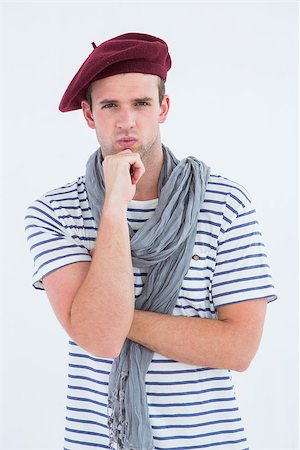 french lifestyle and culture - French guy with beret looking at camera on white background Stock Photo - Budget Royalty-Free & Subscription, Code: 400-08018025
